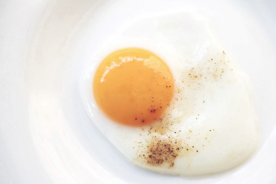sunny side up egg on white ceramic plate